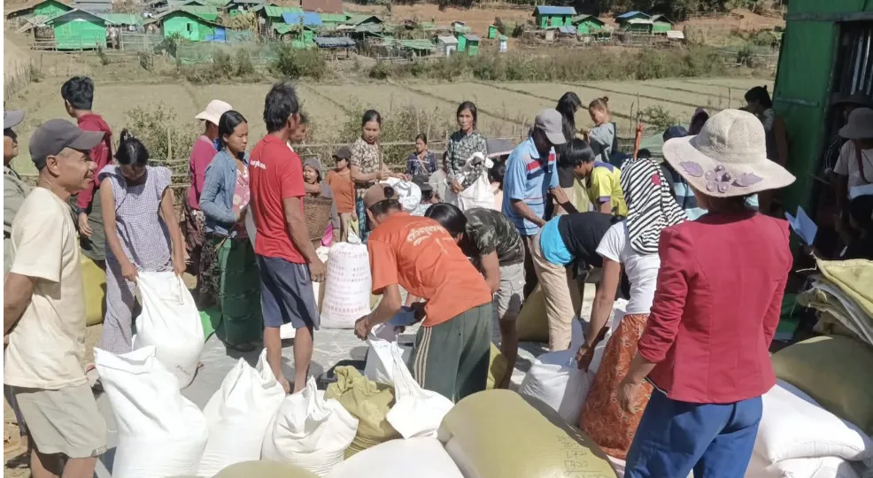 Arranging essential grain rations for immediate delivery to displaced families.
